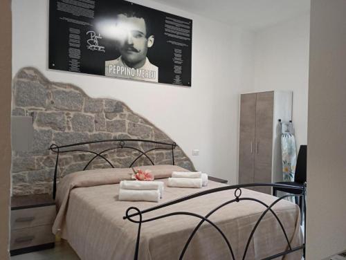 Postel nebo postele na pokoji v ubytování Parole di Sardegna