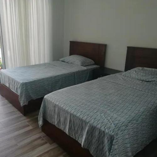 Postel nebo postele na pokoji v ubytování Bejuco Beach House