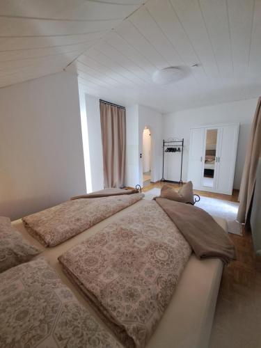 Postel nebo postele na pokoji v ubytování Ferienwohnung Bergblick