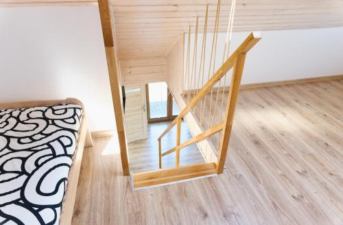 Ένα ή περισσότερα κρεβάτια σε δωμάτιο στο Wolna Koja Apartament Studio Pokój