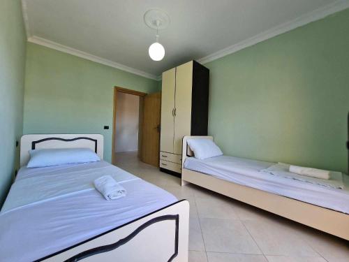 Katil atau katil-katil dalam bilik di DURRES SEA SIDE Apartments