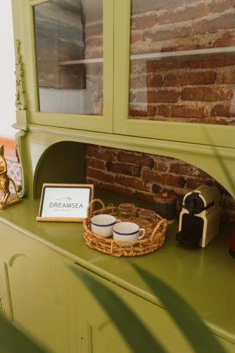 a table with a basket and three bowls on it at Dreamsea Boutique Experience in Moya