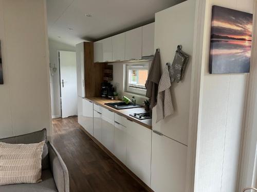 Kuchyň nebo kuchyňský kout v ubytování Tinyhouse Neila
