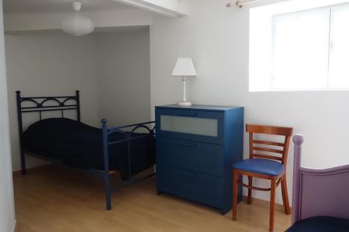 Postel nebo postele na pokoji v ubytování Le Logis de Loulou