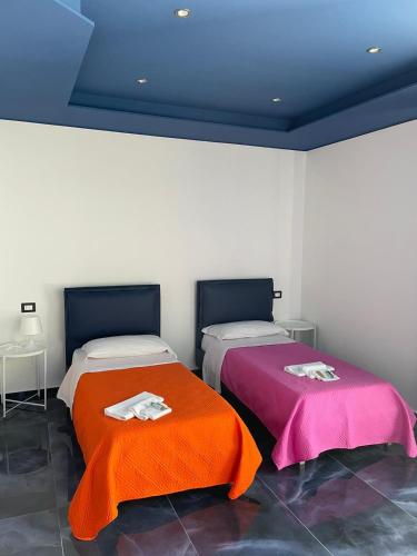 Una cama o camas en una habitación de B&B Resort El Bisagrà