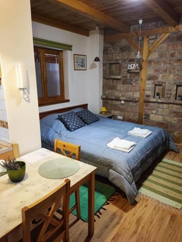 Postel nebo postele na pokoji v ubytování Ferencesek 44 Apartman