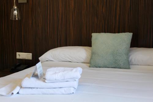 Кровать или кровати в номере Hotel MR Costa Blanca