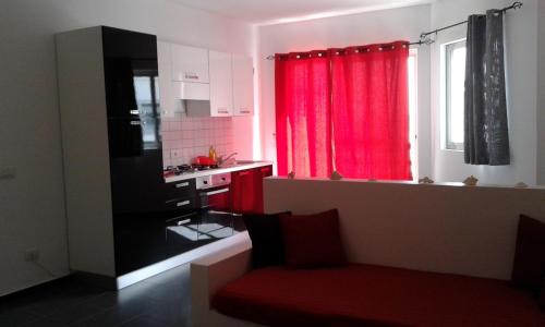 Kuchyň nebo kuchyňský kout v ubytování Cala da Lua apartments