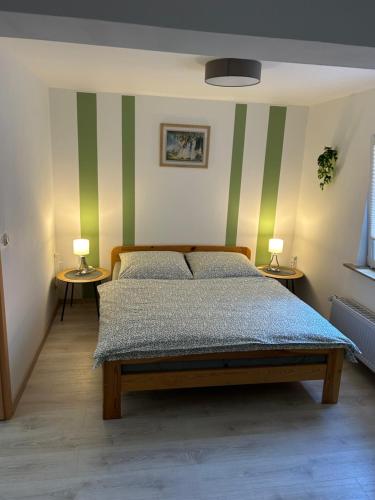 Postel nebo postele na pokoji v ubytování Resi's Gästehaus
