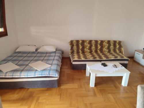 Llit o llits en una habitació de Studio Vanja