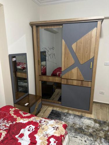 Ένα ή περισσότερα κρεβάτια σε δωμάτιο στο شقة تحفة
