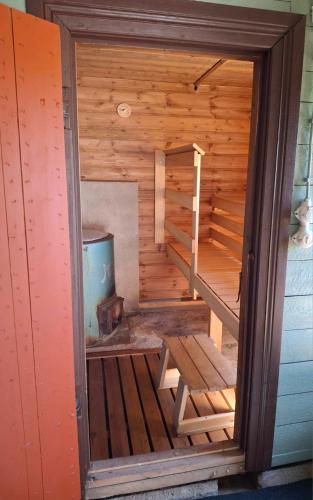an inside view of a sauna in a house at ANNA Jeppo Guesthouses in Uusikaarlepyy