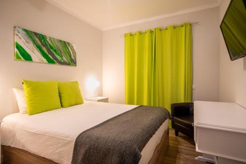 Ένα ή περισσότερα κρεβάτια σε δωμάτιο στο EnSuite 5 Verde Rochedo