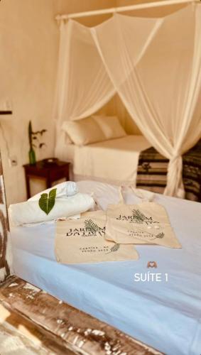 Ένα ή περισσότερα κρεβάτια σε δωμάτιο στο Pousada Jardim da Praça