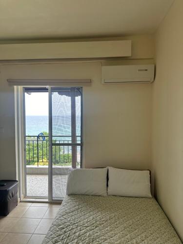 Ένα ή περισσότερα κρεβάτια σε δωμάτιο στο TANIA appartments