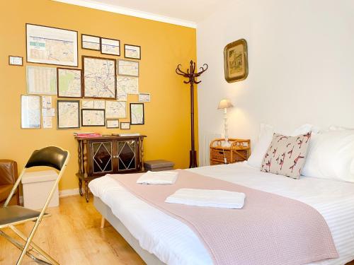 Postel nebo postele na pokoji v ubytování Maison de Charles