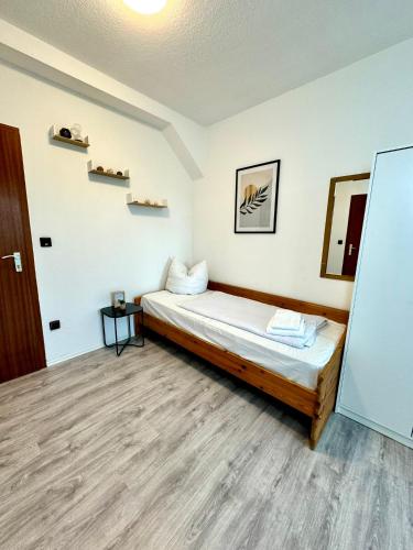 Postel nebo postele na pokoji v ubytování Hotel zum Rücking