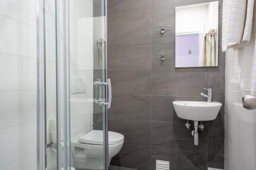Ένα μπάνιο στο EnSuite 4 Laranja Rochedo Traseiras