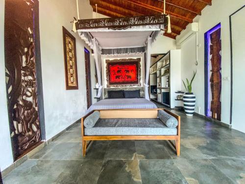 a bedroom with a bed in a room at Waterland in Negombo