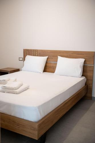 Ένα ή περισσότερα κρεβάτια σε δωμάτιο στο Raptis Apartments