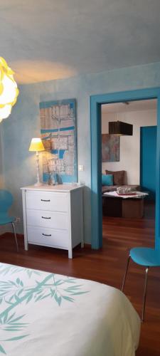 Katil atau katil-katil dalam bilik di Appartements & Chambres Les Loges du Capucin