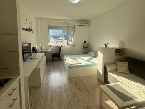 Ένα ή περισσότερα κρεβάτια σε δωμάτιο στο Candy apartments