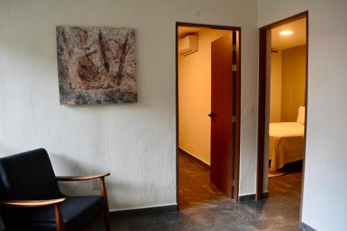 Кровать или кровати в номере Casa Palmas