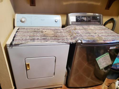 a stove top oven sitting next to a microwave at PACIFIC VISTA, Panoramic Beach & Ocean Views in Sámara