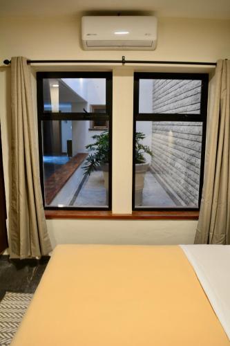 Кровать или кровати в номере Casa Palmas