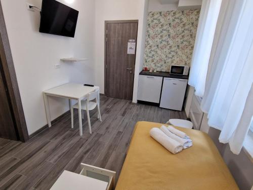 Ένα ή περισσότερα κρεβάτια σε δωμάτιο στο Belfiore Alloggi Turistici