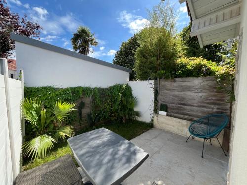 En have udenfor Maisonnette plain-pied avec son extérieur