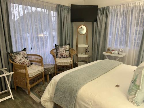 Ένα ή περισσότερα κρεβάτια σε δωμάτιο στο Tree Aloe Guest house