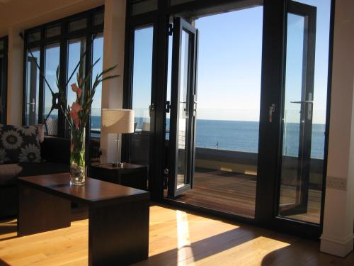 Riviera Apartments, Teignmouth - Seafront Penthouse Apartments with Large Wrap-Around Balconies & St