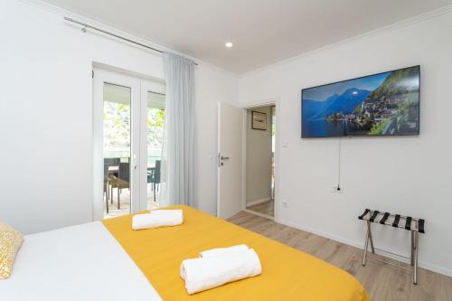 Postel nebo postele na pokoji v ubytování Villa Three Olives