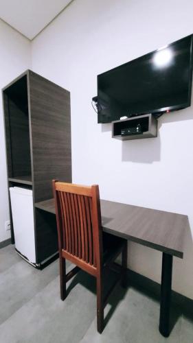 TV a/nebo společenská místnost v ubytování Hotel Valentine