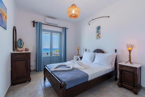 Letto o letti in una camera di Blue Eyes Beach Villas