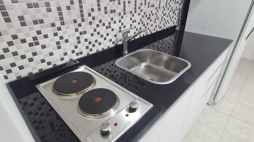 Dapur atau dapur kecil di Eloise II, excelente ubicación y con todo lo que necesitas!