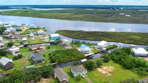 an aerial view of a home on a river at Getting Nauti at the Bay in Shoreline Park
