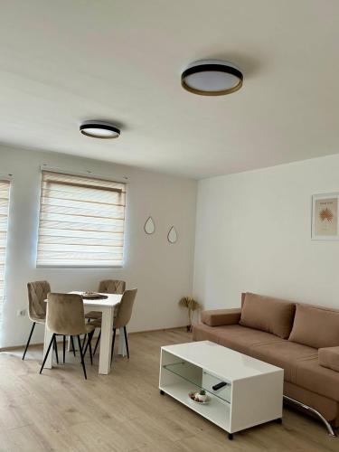 a living room with a couch and a table at Jelena in Jajce