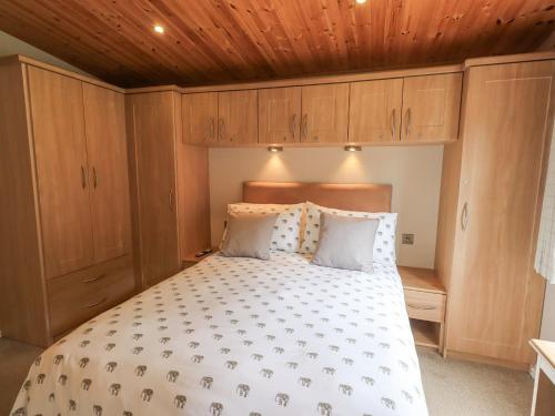 Ένα ή περισσότερα κρεβάτια σε δωμάτιο στο Esthwaite Lodge