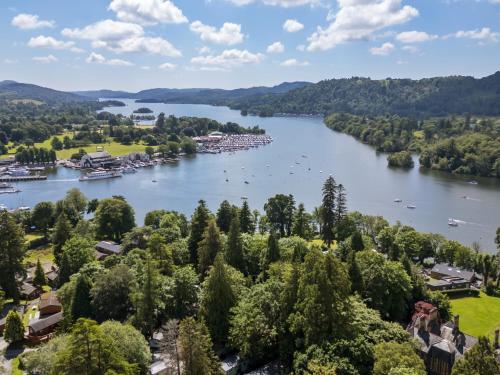 an aerial view of a river with boats on it at Broad Larch Lodge in Bowness-on-Windermere