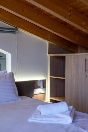 Una cama o camas en una habitación de Prodano