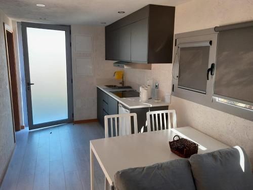 Dapur atau dapur kecil di Cantinho de Trevoeiros - Casa Duarte