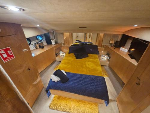an overhead view of a bedroom in a boat at Rhapsody in Blue in Chertsey