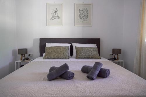 Кровать или кровати в номере BookHome by Greece Apartments