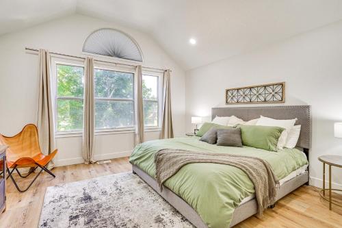 a bedroom with a large bed and a window at Cottonwood Heights Escape Near Hiking and Skiing in Cottonwood Heights