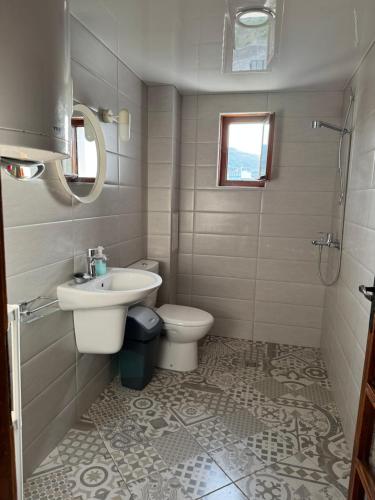 a bathroom with a sink and a toilet at obzor, orkinos in Obzor