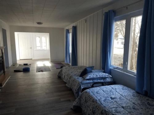 Postel nebo postele na pokoji v ubytování Unity House