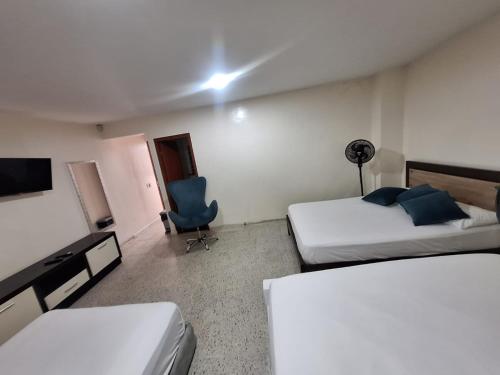 Кровать или кровати в номере Hotel Villa Park Real
