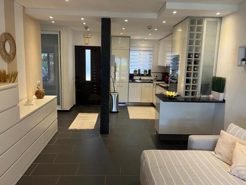 Η κουζίνα ή μικρή κουζίνα στο ADO HOUSE Albufeira